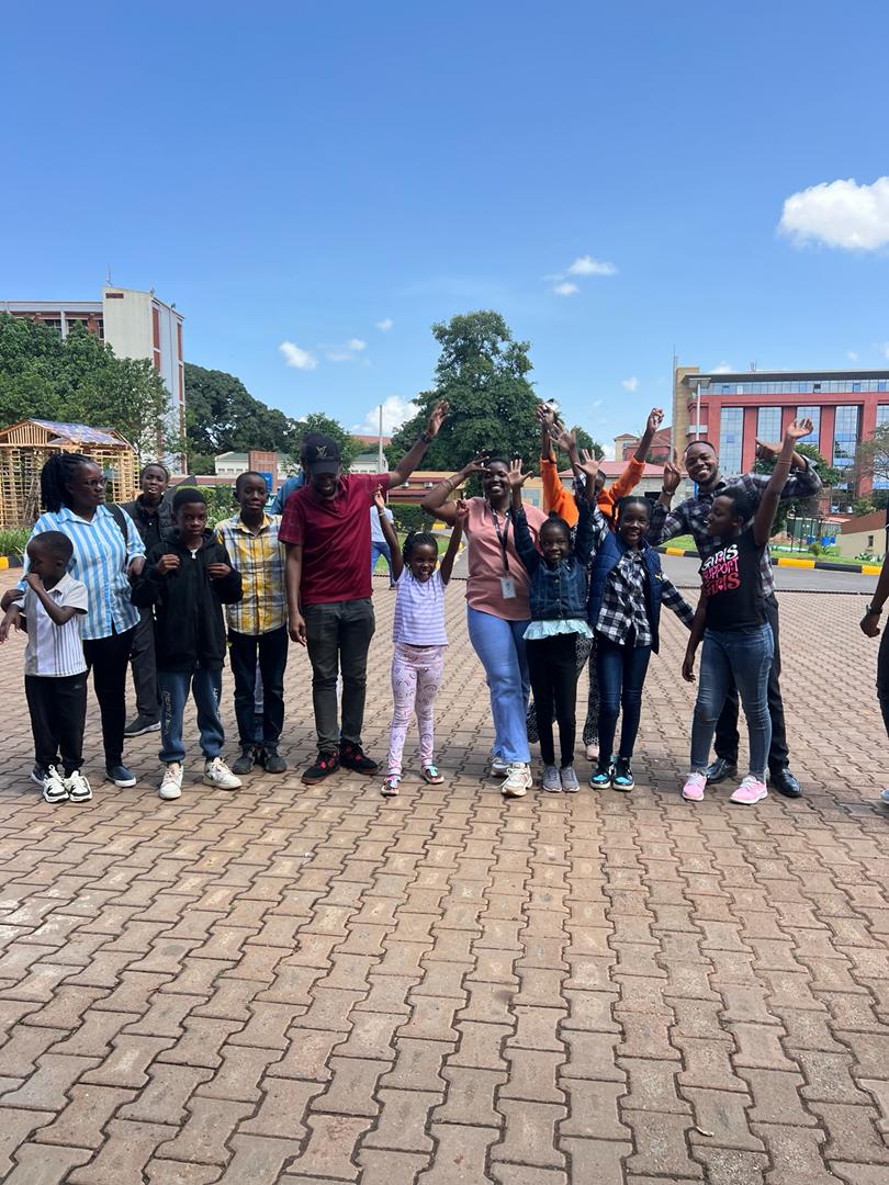 Learners celebrating together at the end of a camp